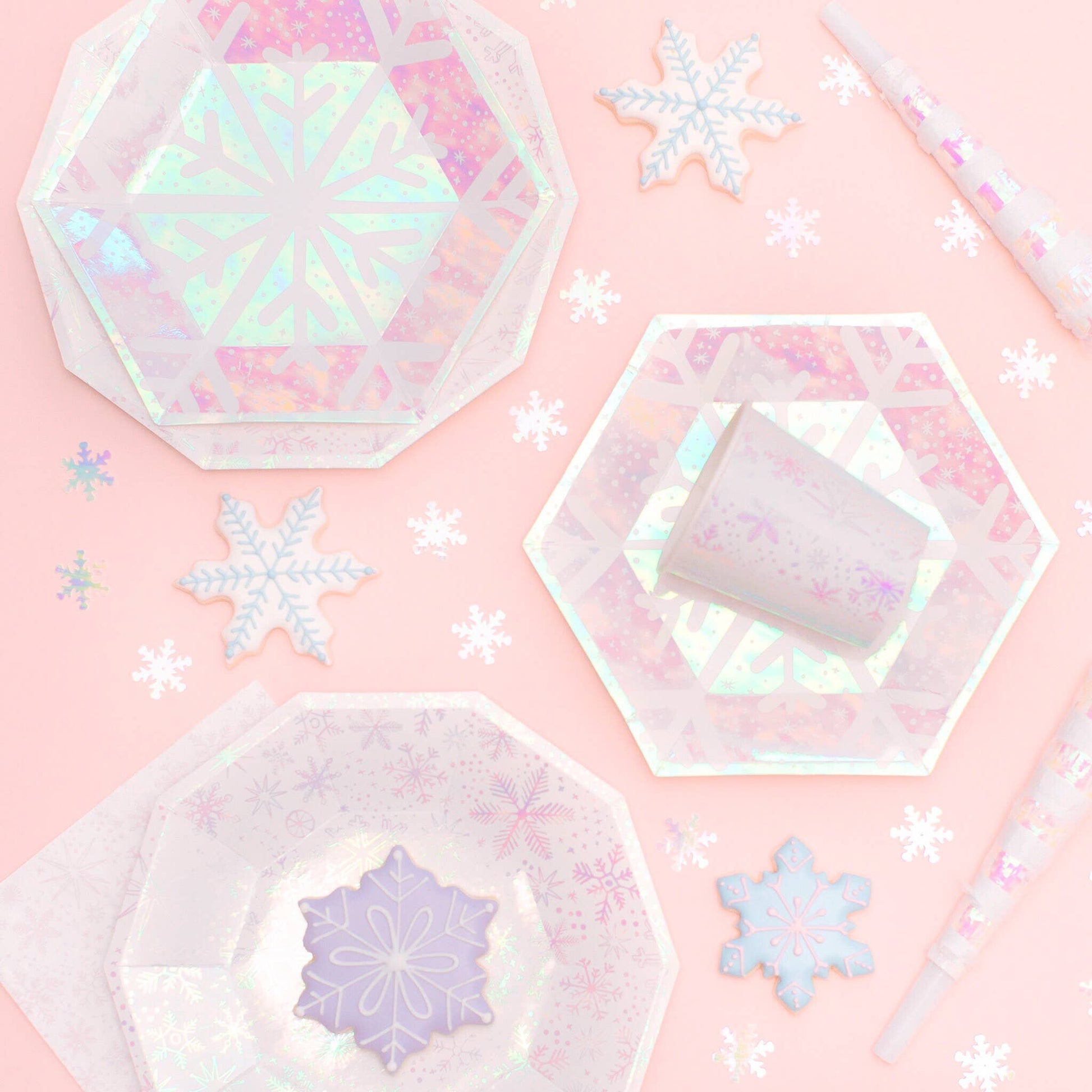 Iridescent snowflake plates for Frozen-themed birthdays and holiday celebrations