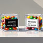 Acrylic candy favor box with themed tag and your choice of gummies or chocolates.