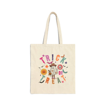 Halloween Cowboy Ghost Trick or Treating bag made from durable natural canvas, featuring a colorful ghost design. This 15" x 16" tote with 20" handles is perfect for kids, teachers, and Halloween lovers to collect candy, carry books, or use as a festive fall bag.