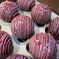 Box of four flavored hot cocoa bombs for cozy drinks