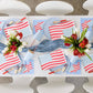 Paper dinner plates featuring red, white, and blue die-cut design, pack of 8.