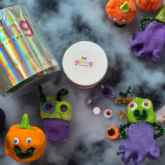 Halloween Sensory Kit for kids, spooky themed activities including witch, pumpkin, and alien themes, promoting fine motor skills and creativity.