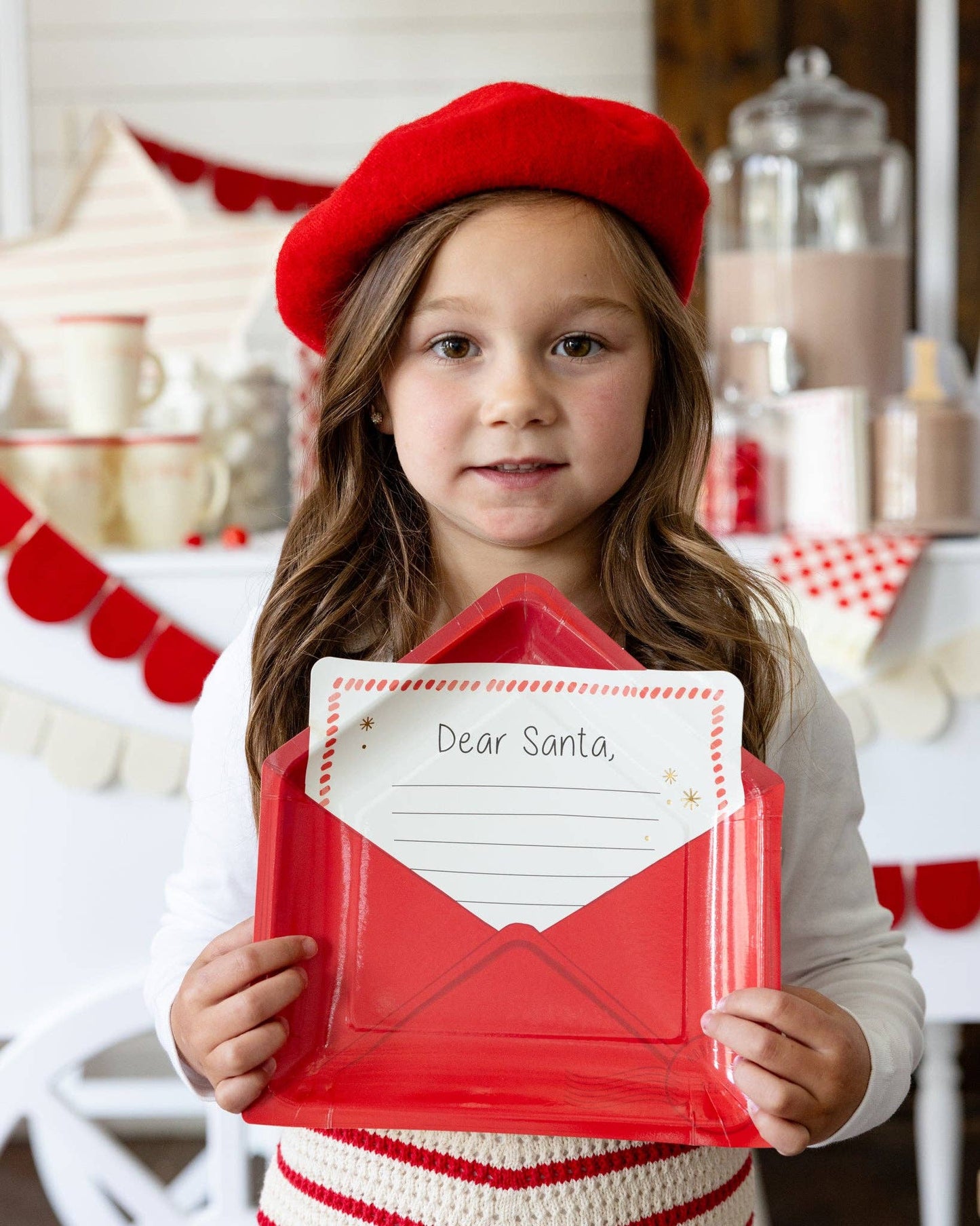 Whimsical "Dear Santa" paper plates for holiday meals. Shaped like a letter to Santa in an envelope, perfect for kids and adults. Includes 8 plates (9.5" x 9"), ideal for festive gatherings. Santa-approved design for a fun, memorable table setting.