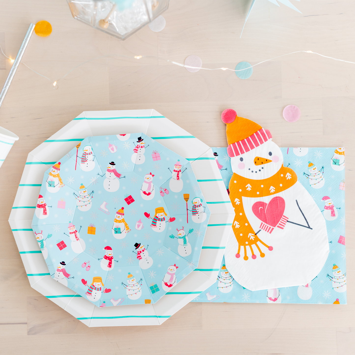 Festive snowman guest napkins in pastel winter palette, 8 x 4.25 inches