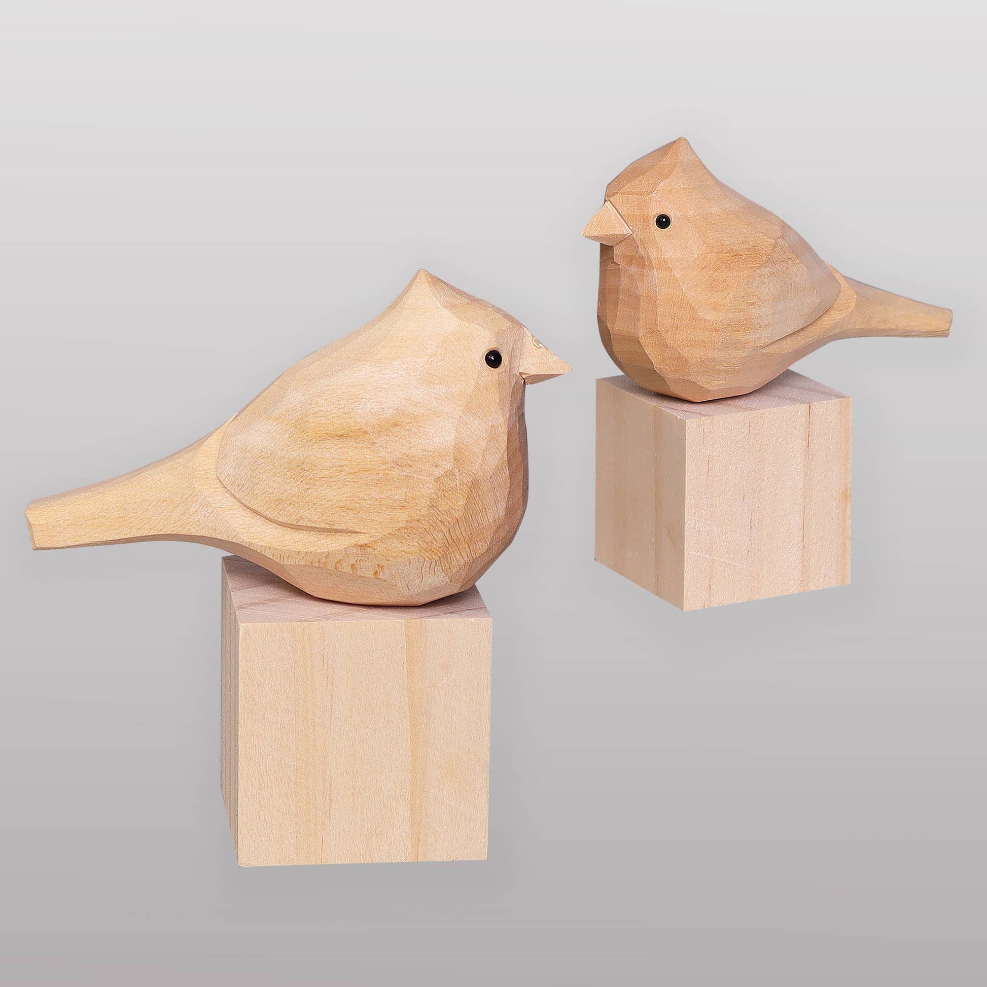 Nest and hand-painted cardinals for display