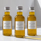 Elegant olive oil favors – 4.5” acrylic bottle with low-acid cold-pressed olive oil for events.