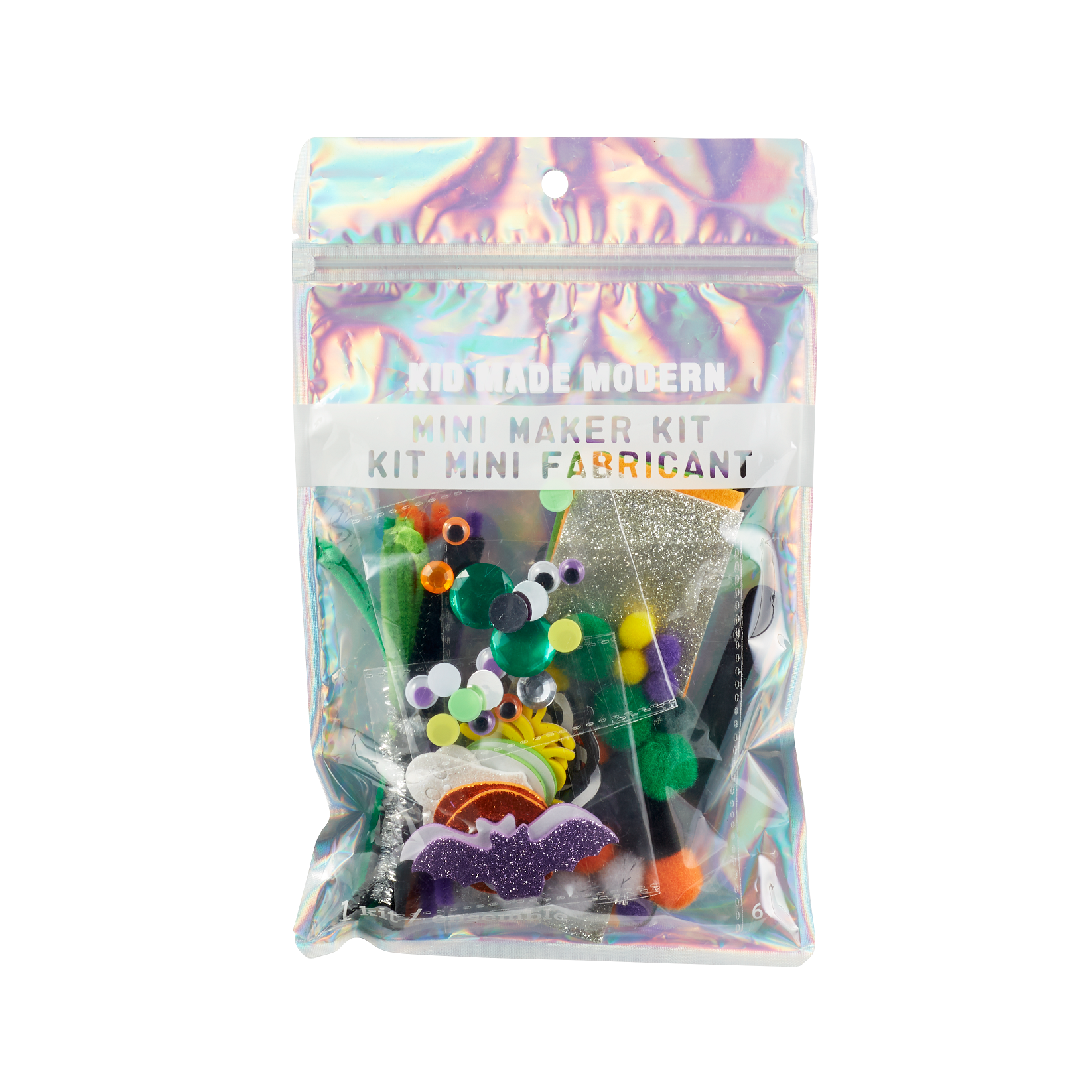 Halloween Mini Maker Kit for kids, featuring a resealable iridescent pouch filled with fuzzy sticks, pom poms, googly eyes, craft supplies, and foam stickers for creative Halloween crafting fun. Perfect for ages 6 and up.