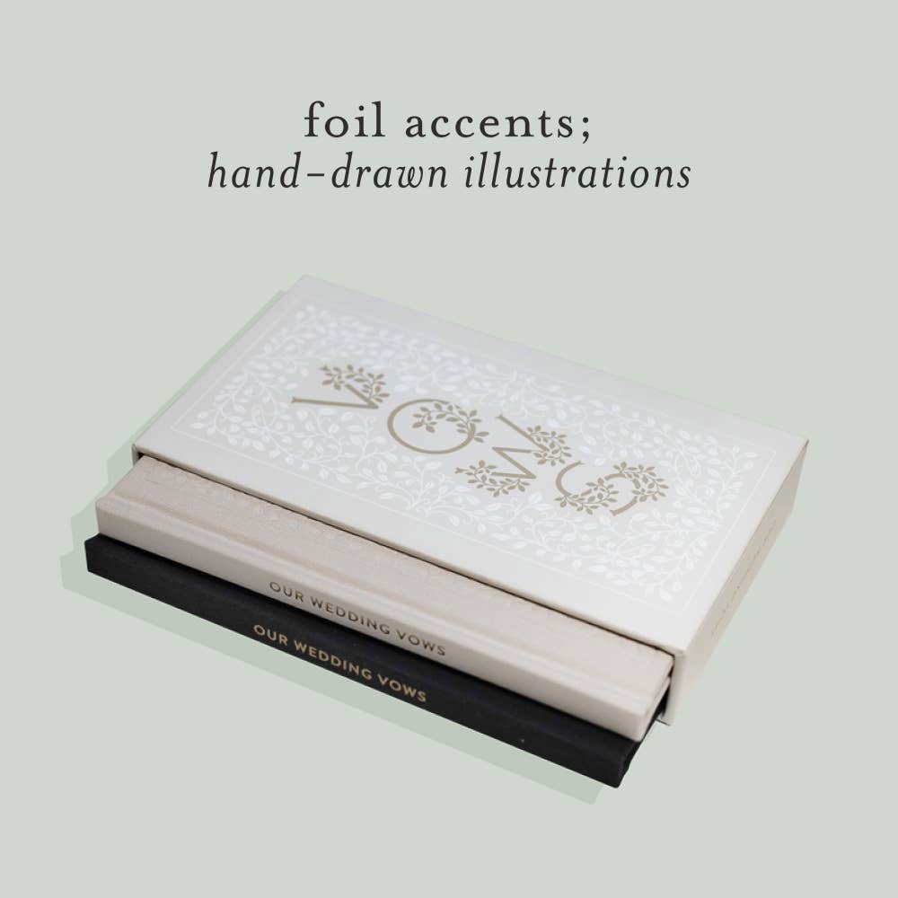 Linen wedding vow notebooks on ceremony table