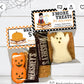 Halloween-themed s'mores treat bag with festive packaging featuring pumpkins, ghosts, and "S'more Treats For My Peeps" message. Includes marshmallows, chocolate bars, and graham crackers for a fun and spooky Halloween gift. Perfect for Boo Bags, party favors, or trick-or-treat surprises.