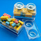 Block-themed candy favor in a brick-shaped box, perfect for birthday parties or playdates. Includes Lego-themed candies with optional cellophane wrap and thank you label. Custom candy containers available upon request.
