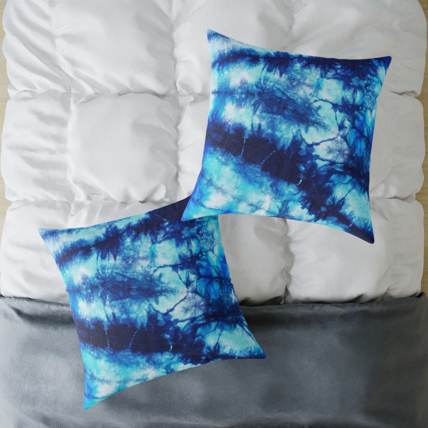 Blue Tie Dye Square Poly Canvas Pillow with a playful design, perfect for adding a pop of color to any room. Ideal for lounging or snuggling, this eye-catching pillow enhances your home decor while reflecting your unique style.
