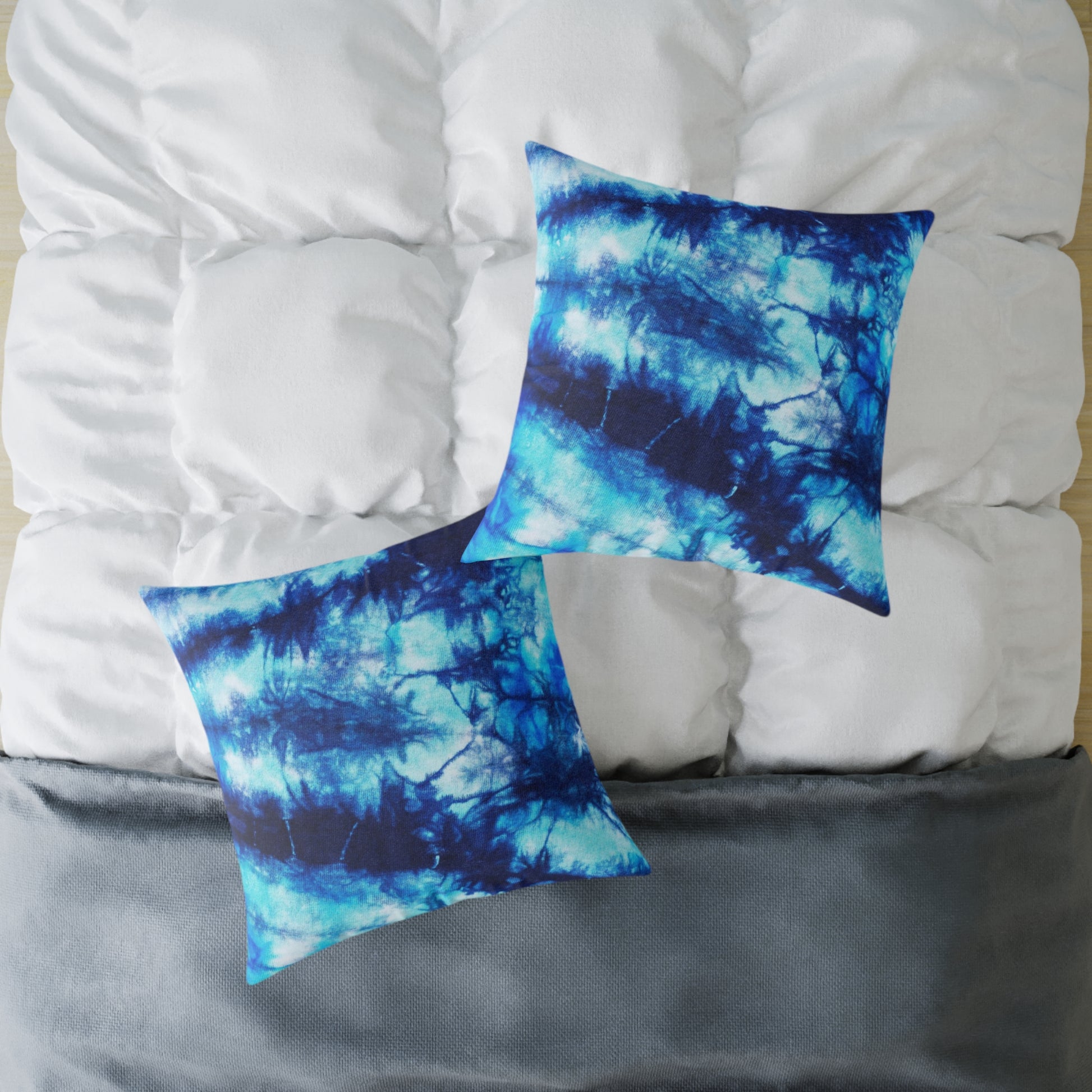 Blue Tie Dye Square Poly Canvas Pillow with a playful design, perfect for adding a pop of color to any room. Ideal for lounging or snuggling, this eye-catching pillow enhances your home decor while reflecting your unique style.