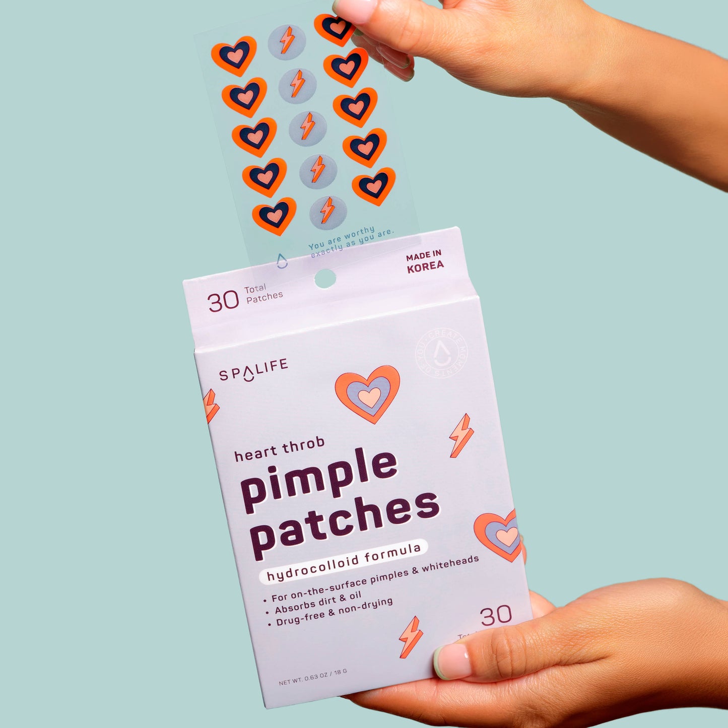 Valentine pimple patches on skin close up