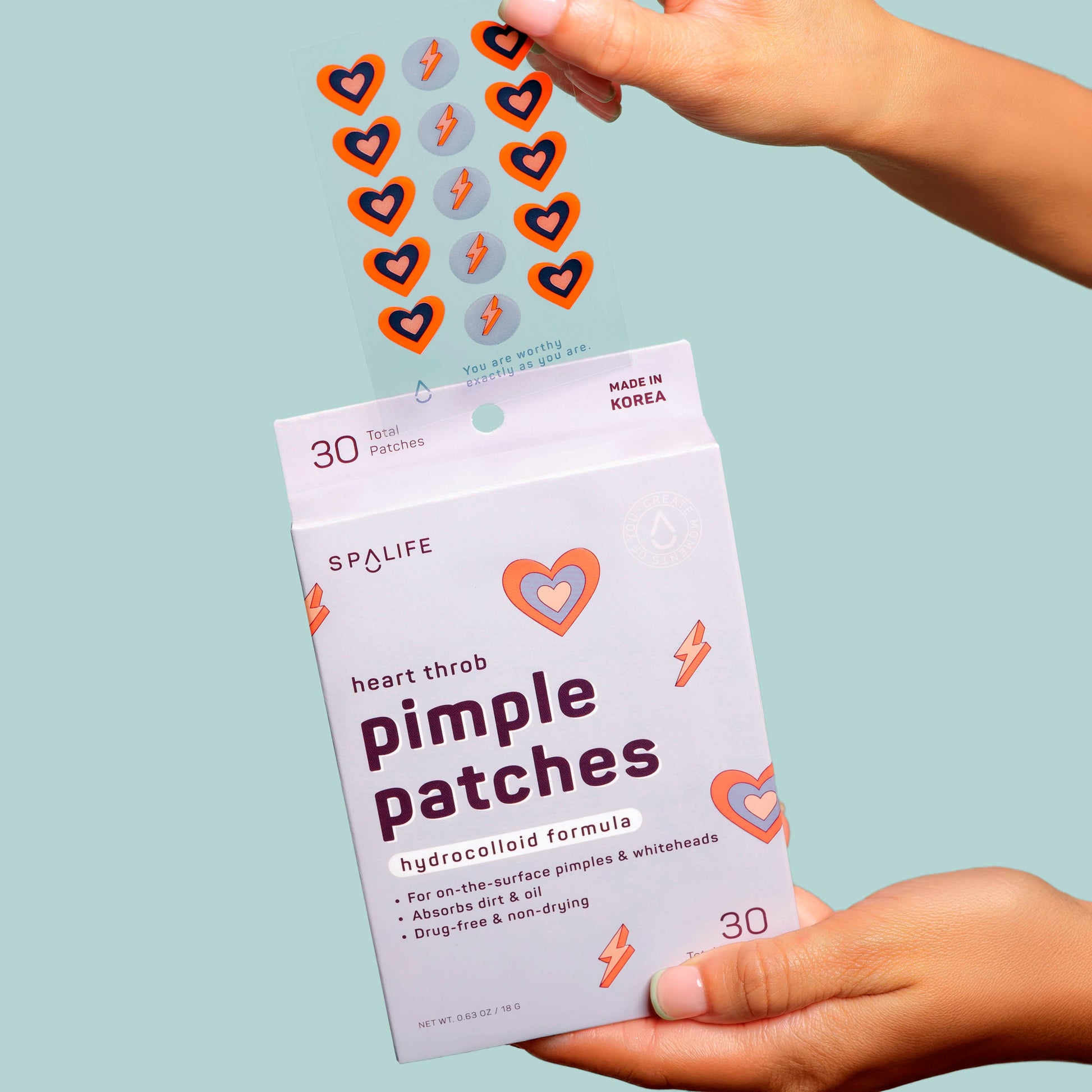 Valentine pimple patches on skin close up