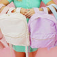 Solid backpack perfect for school, gym, or travel. Features easy clean lining and a spot clean exterior. Dimensions are 16" x 11" x 5", making it ideal for students and everyday use. Durable and versatile for multiple occasions.
