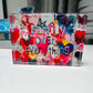 "Family Over Everything" 4x6 Crystal Block – Freestanding acrylic table decor with heartfelt message.