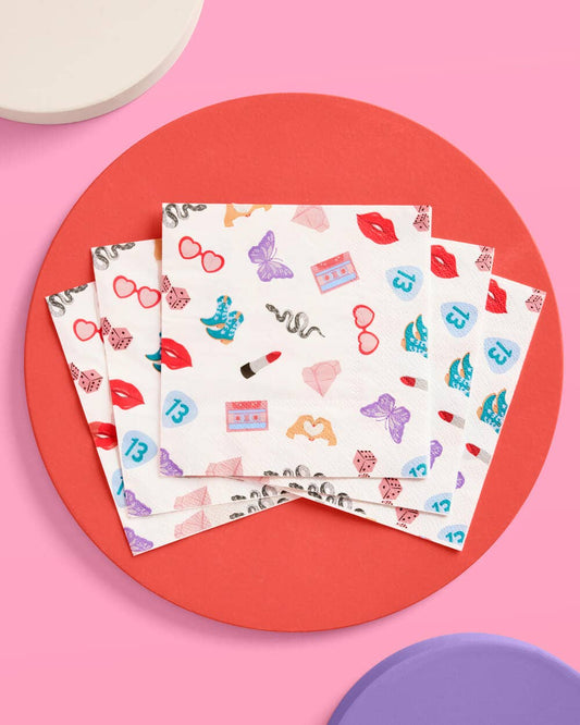 Era-themed white paper napkins with icons