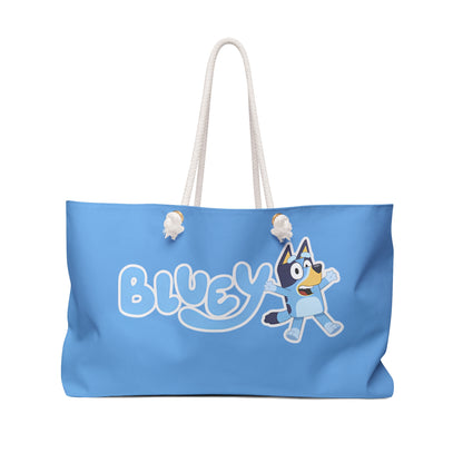 Oversized Bluey themed beach bag featuring a playful design inspired by the episode "The Pool," perfect for family adventures at the beach or pool. The durable tote measures 24" x 13" and includes thick rope handles for easy carrying.