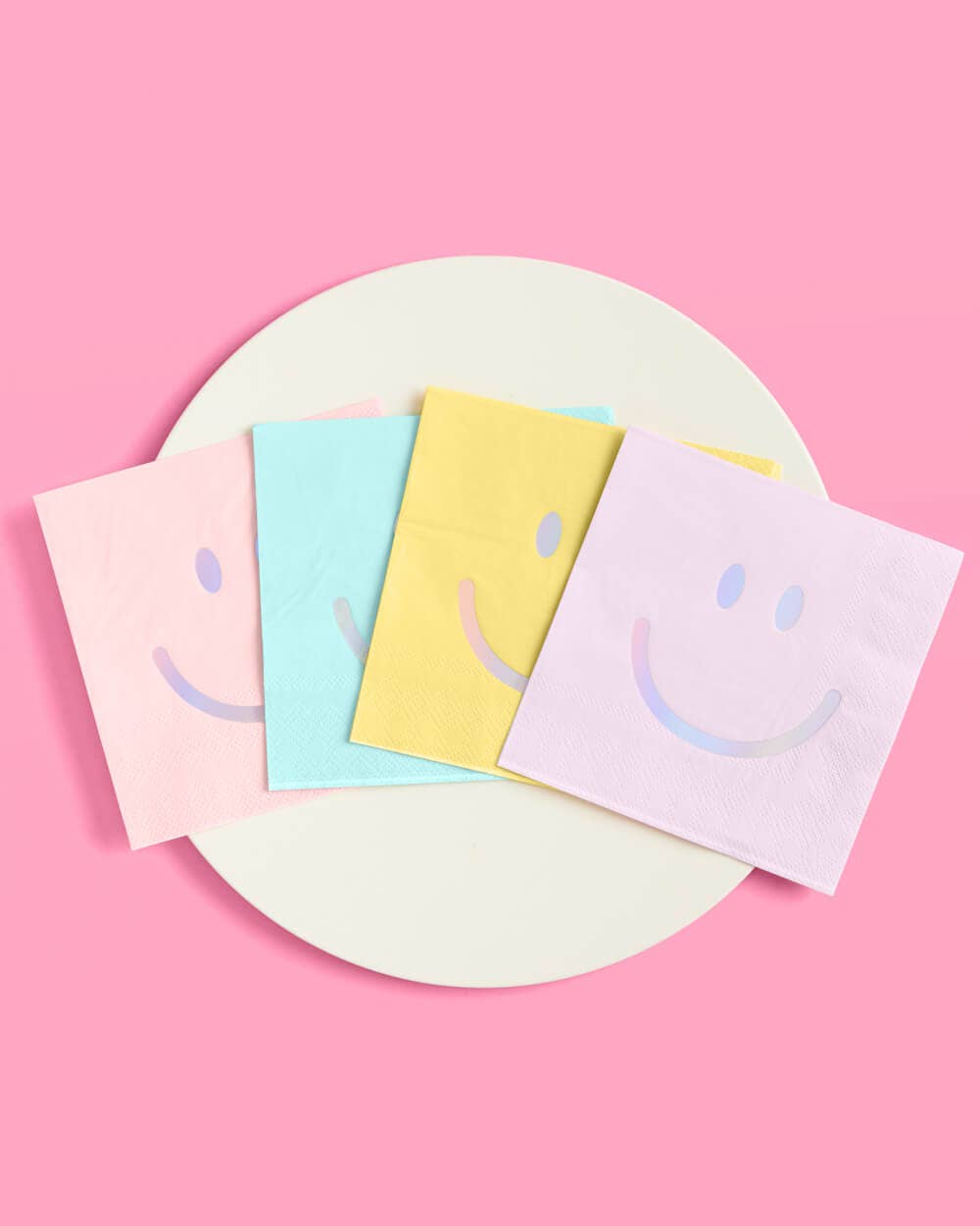 Rainbow foil curtain with pastel balloons and smiley plates