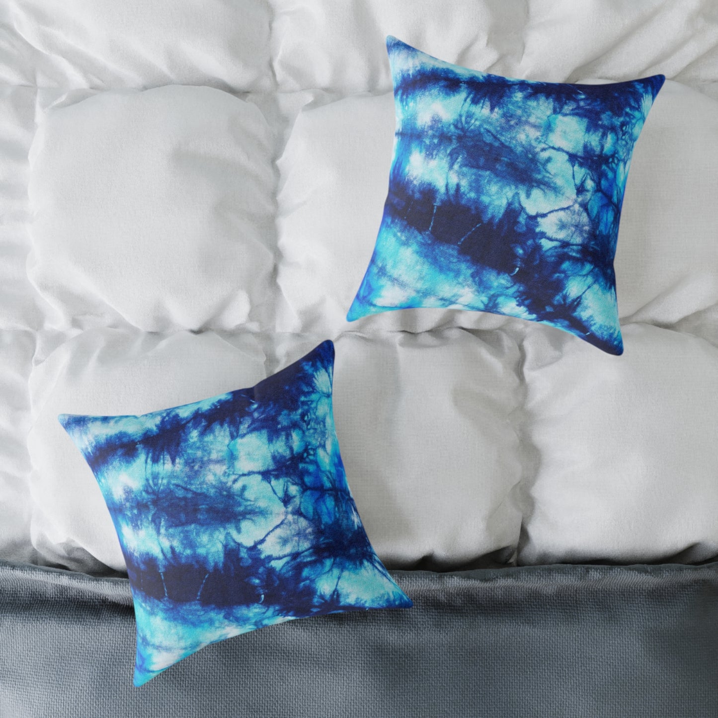 Blue Tie Dye Square Poly Canvas Pillow with a playful design, perfect for adding a pop of color to any room. Ideal for lounging or snuggling, this eye-catching pillow enhances your home decor while reflecting your unique style.