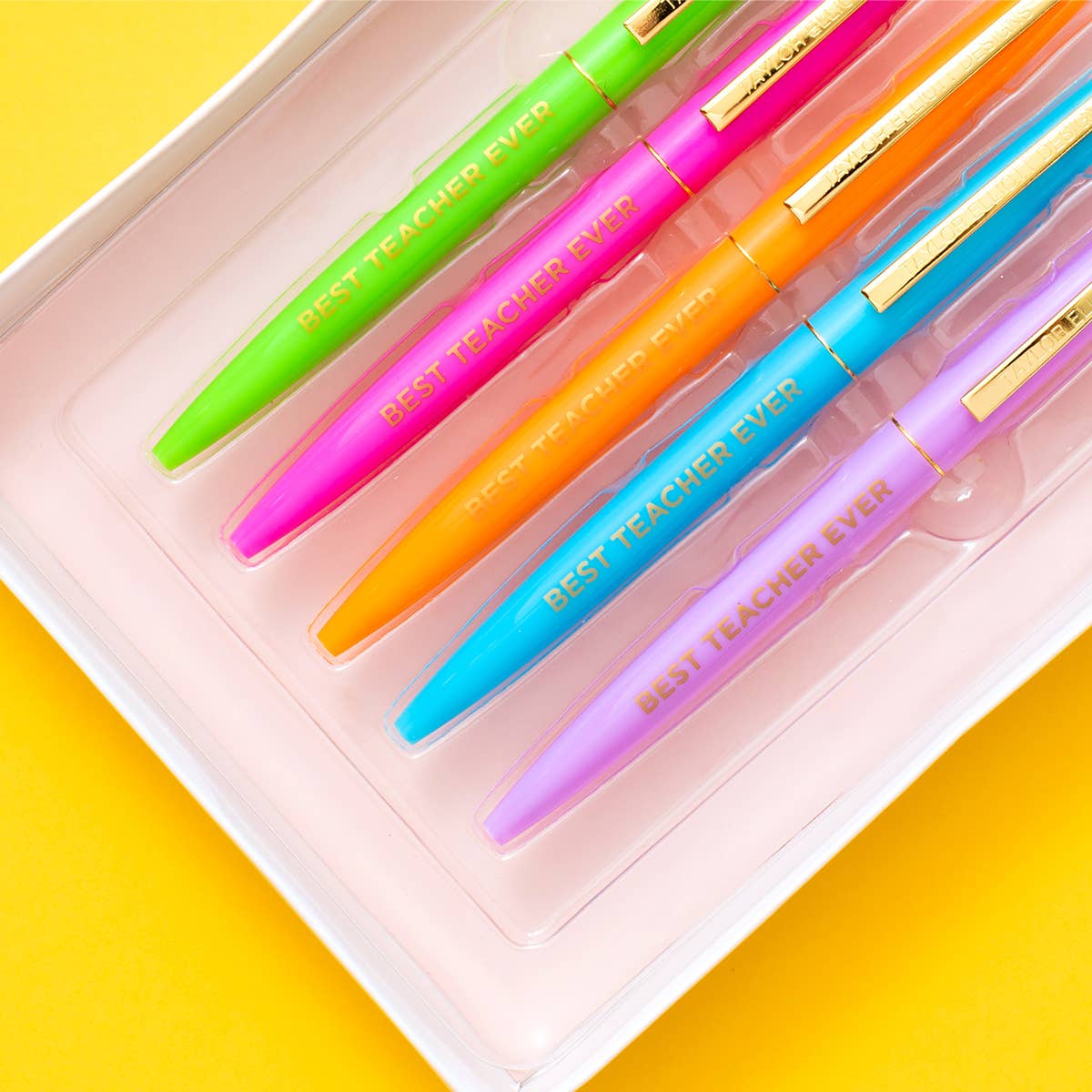 Best Teacher Ever ballpoint pen set with 5 colorful pens, gold foil details, perfect for gifts and desk accessories.