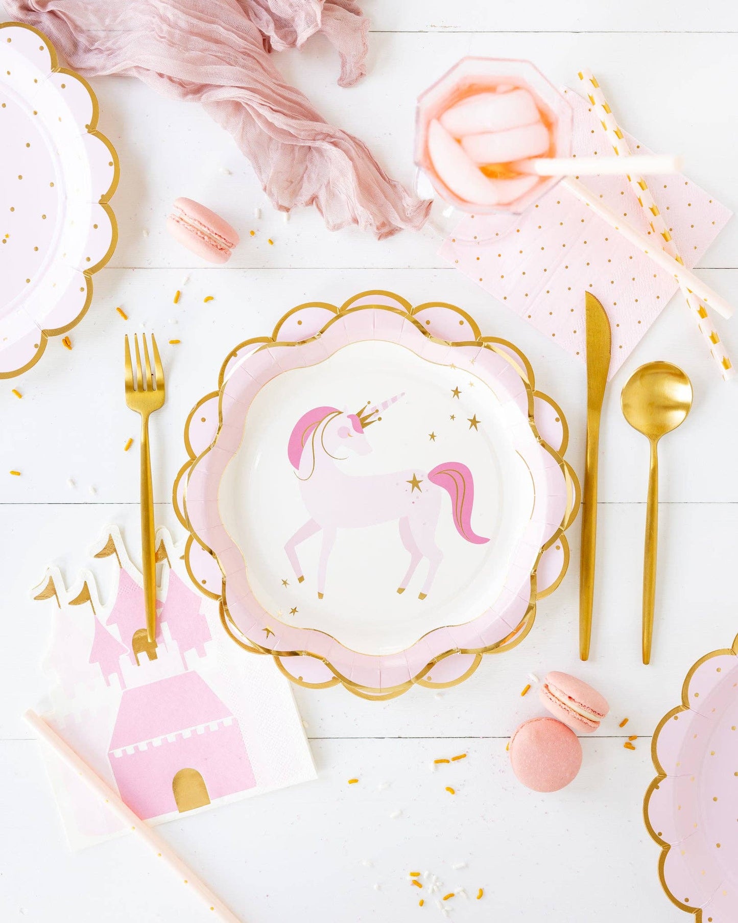 Princess castle-shaped guest napkins, measuring 6" x 7", featuring gold foil accents. Perfect for adding elegance and fun to any royal-themed event or party.