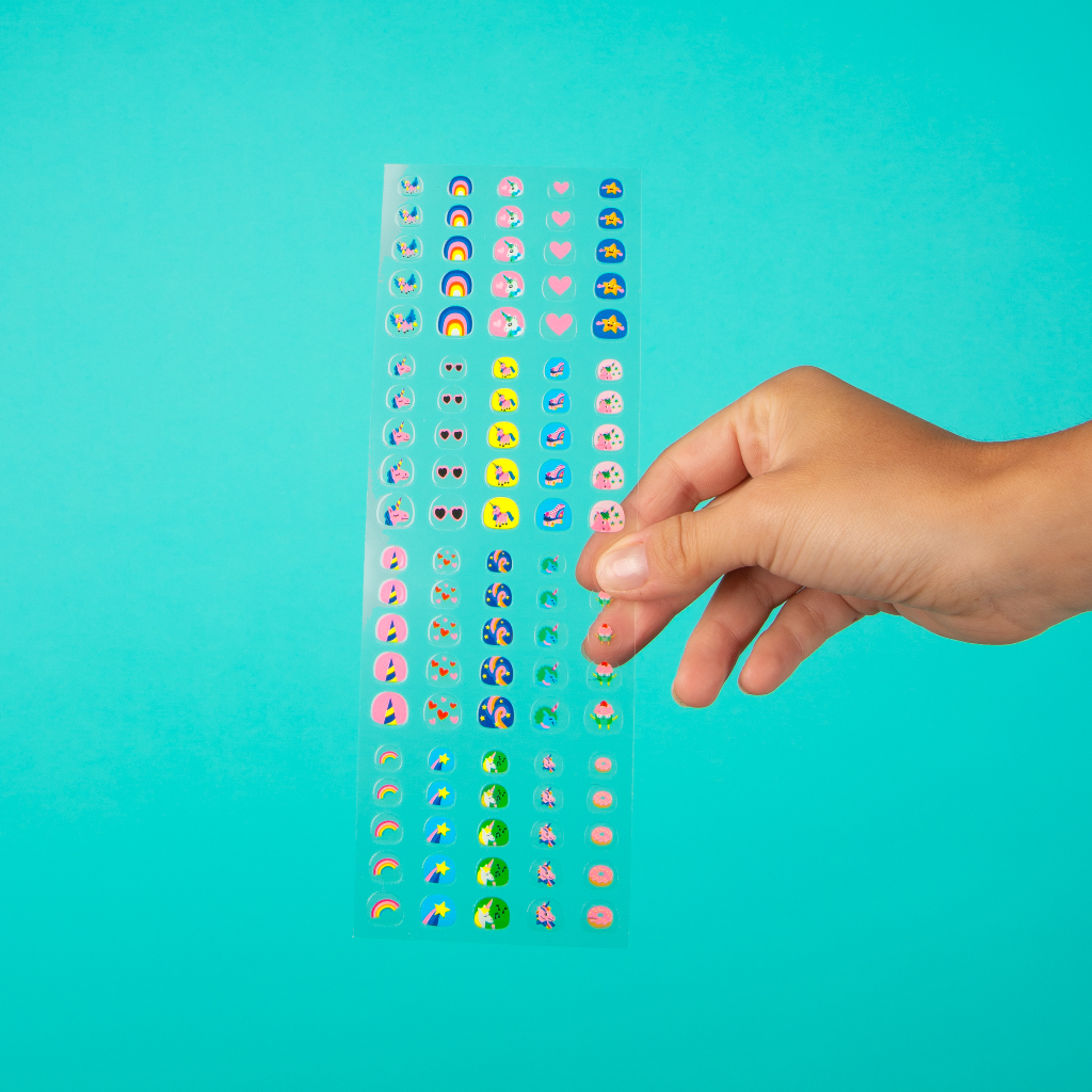 Lily the Unicorn nail stickers for kids, featuring 200 easy-to-use stickers that fit hands of all sizes. Durable for 1-2 days and hand-wash safe, perfect for imaginative play and unicorn-themed parties. Fun nail art set for kids, packaged in a 28 x 11 cm envelope.