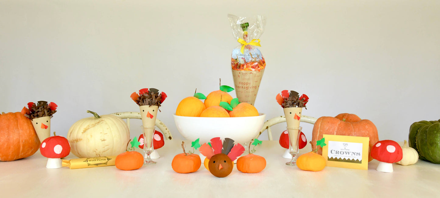 Handcrafted TOPS Malibu Surprize Cones with vintage-inspired toys, sweets, gems, and interactive surprises. Perfect as Thanksgiving hostess gifts, party favors, or table decor. Made in the USA for adults and kids over 3.