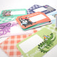 Set of 24 assorted scratch-off lunchbox notes measuring 2” x 3.5”, featuring six different animated animal friends designs. Each card allows you to write a personalized message in the blank space, which is then covered with a scratch-off sticker for a fun reveal. Perfect for slipping into lunch bags or coat pockets, these tiny notes come packaged in a clear plastic box, making them an ideal surprise for someone special. 