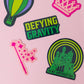 Set of 5 Wicked-themed stickers inspired by the Broadway musical, featuring vibrant designs on durable, high-quality material. Perfect for personalizing laptops, water bottles, and notebooks, or gifting to Broadway fans.