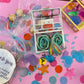 Magical Mermaid Candy favor in a gold or silver treasure chest, featuring rainbow mermaid tail candy with a sour punch. Perfect for under-the-sea or birthday party themes. Colors may vary from photos due to manufacturing differences