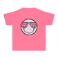 Kids’ summer t-shirt with a leopard print smiley face and watermelon sunglasses. Soft, durable cotton, available in youth sizes XS-XL. Perfect for summer activities.