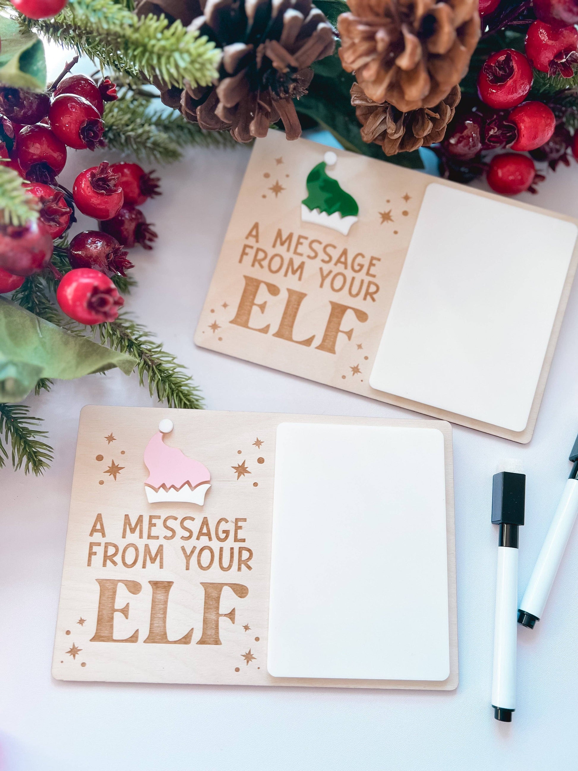 Elf welcome back note board on wood