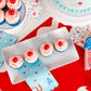 Patriotic cocktail napkins with playful ice cream and popsicle designs.