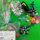 Charming airplane candy favor in a perfect-sized container, featuring themed labels and wrapped in cellophane. Perfect for adding fun to birthday celebrations.