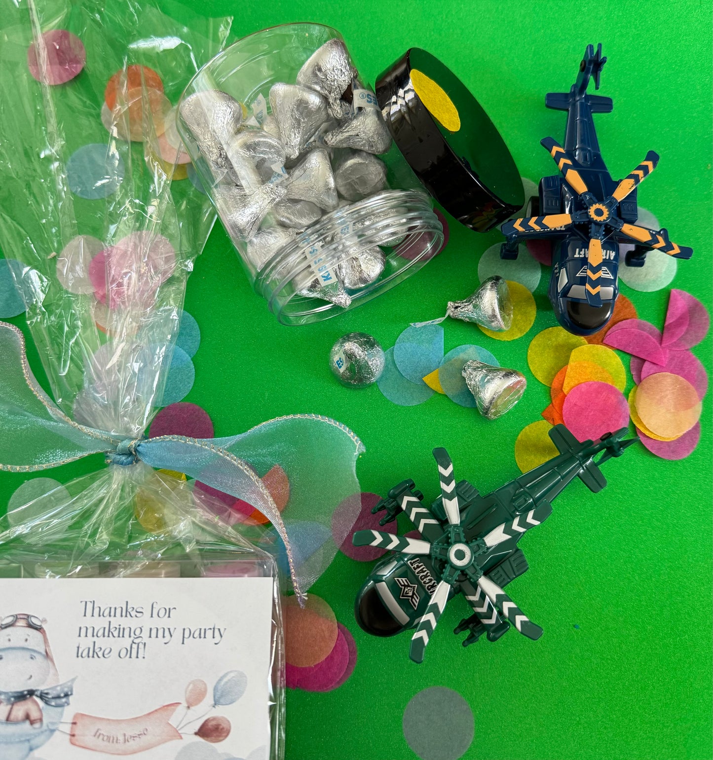 Charming airplane candy favor in a perfect-sized container, featuring themed labels and wrapped in cellophane. Perfect for adding fun to birthday celebrations.
