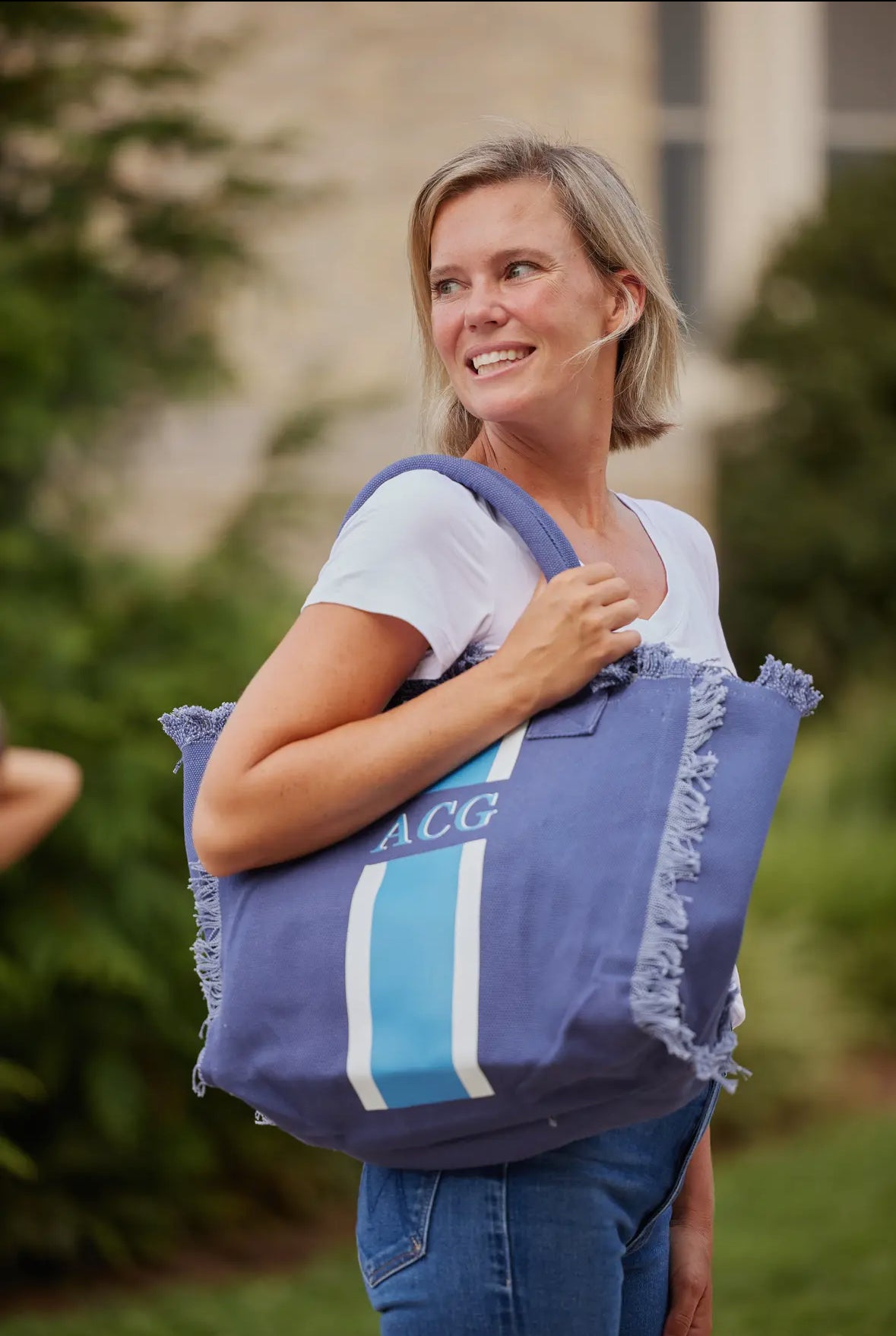 Stylish City Stripe Tote featuring a unique monogram design, perfect for city-goers to carry essentials in style.