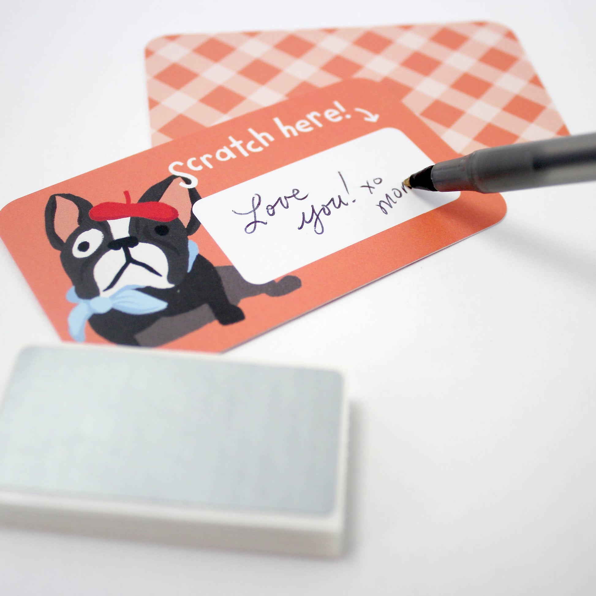 Set of 24 assorted scratch-off lunchbox notes measuring 2” x 3.5”, featuring six different animated animal friends designs. Each card allows you to write a personalized message in the blank space, which is then covered with a scratch-off sticker for a fun reveal. Perfect for slipping into lunch bags or coat pockets, these tiny notes come packaged in a clear plastic box, making them an ideal surprise for someone special. 