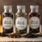 Custom tea favors – ‘Love is Brewing’ acrylic bottle with premium loose tea for weddings.