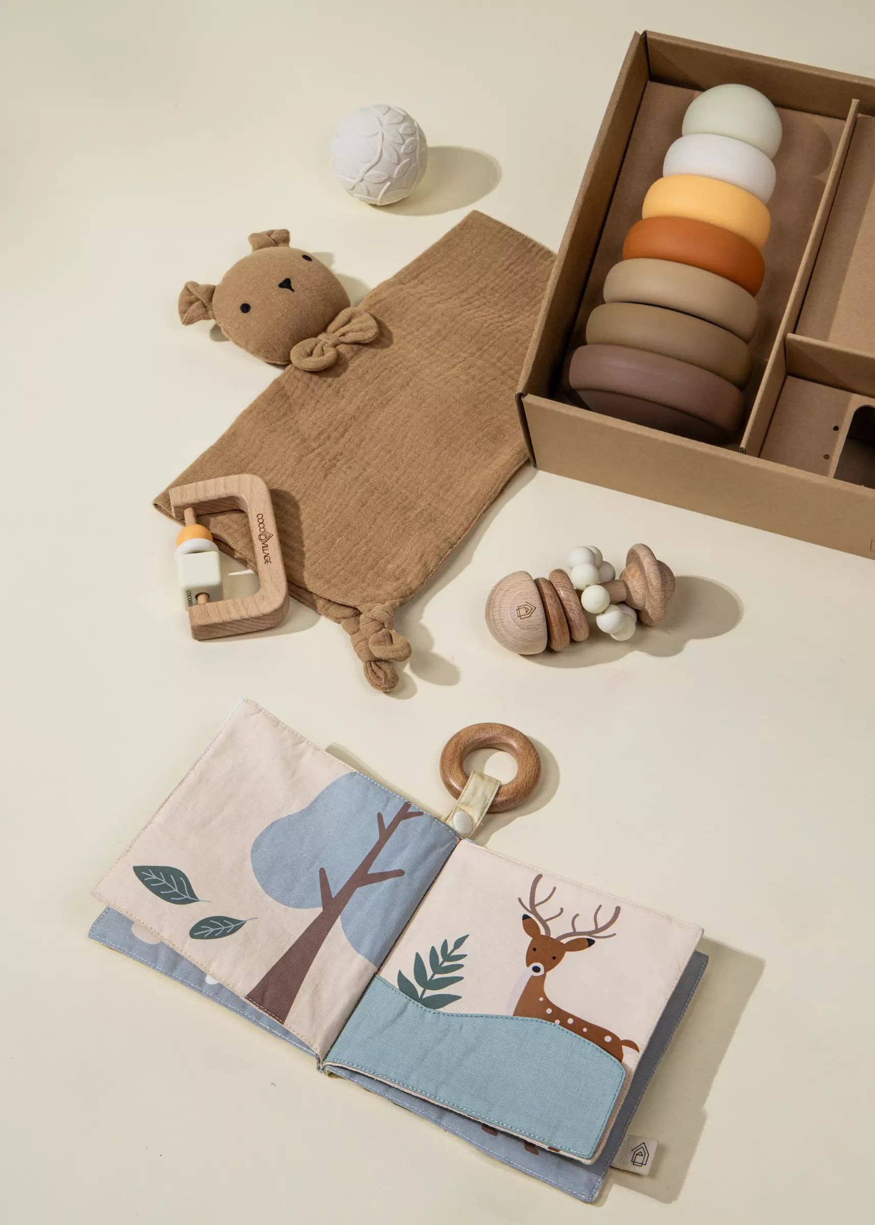 Newborn gift set including stacking tower and silicone teether