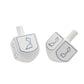 Whimsical Salt and Pepper Dreidel Box designed for Hanukkah celebrations. Features two compartments for seasoning storage in a dreidel shape. A playful, functional addition to your table. Dimensions: 2.17" diameter x 3.78" height.