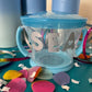 Spill-proof snack pack for toddlers that holds 9 ounces of snacks, featuring a design that fits most standard cup holders. Dishwasher safe for easy cleaning.