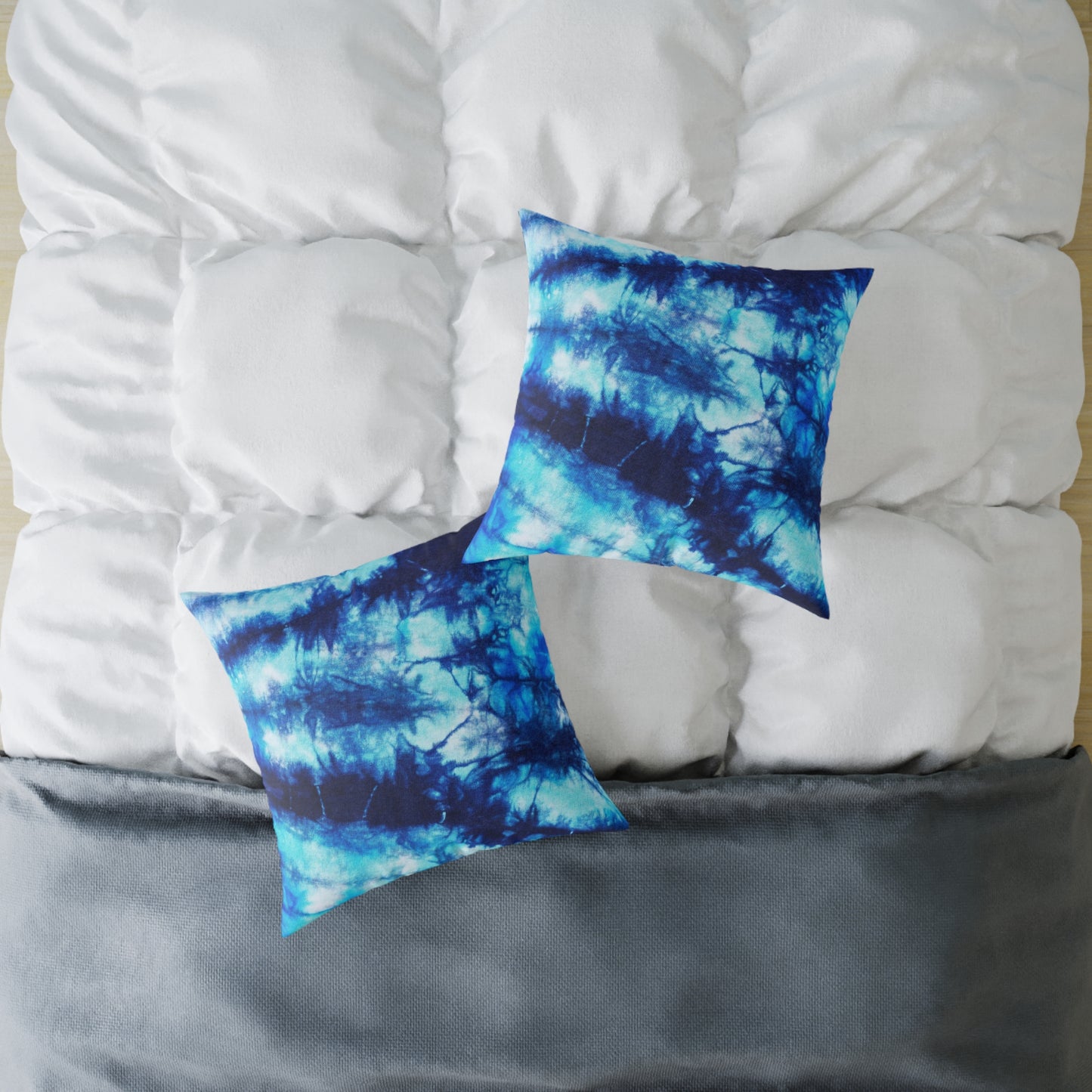 Blue Tie Dye Square Poly Canvas Pillow with a playful design, perfect for adding a pop of color to any room. Ideal for lounging or snuggling, this eye-catching pillow enhances your home decor while reflecting your unique style.