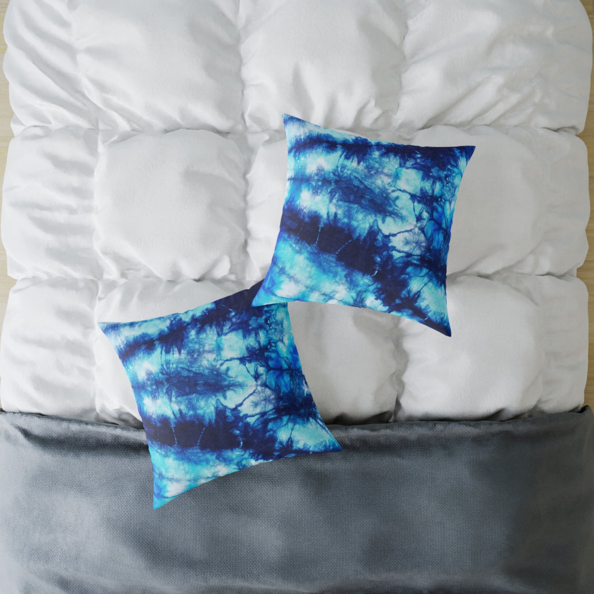 Blue Tie Dye Square Poly Canvas Pillow with a playful design, perfect for adding a pop of color to any room. Ideal for lounging or snuggling, this eye-catching pillow enhances your home decor while reflecting your unique style.
