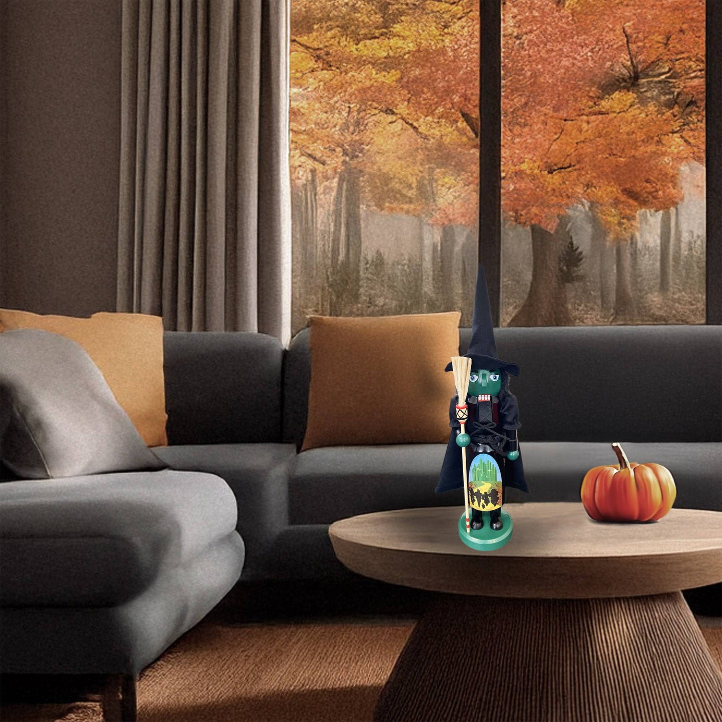 Green-faced witch nutcracker with black hat and dress