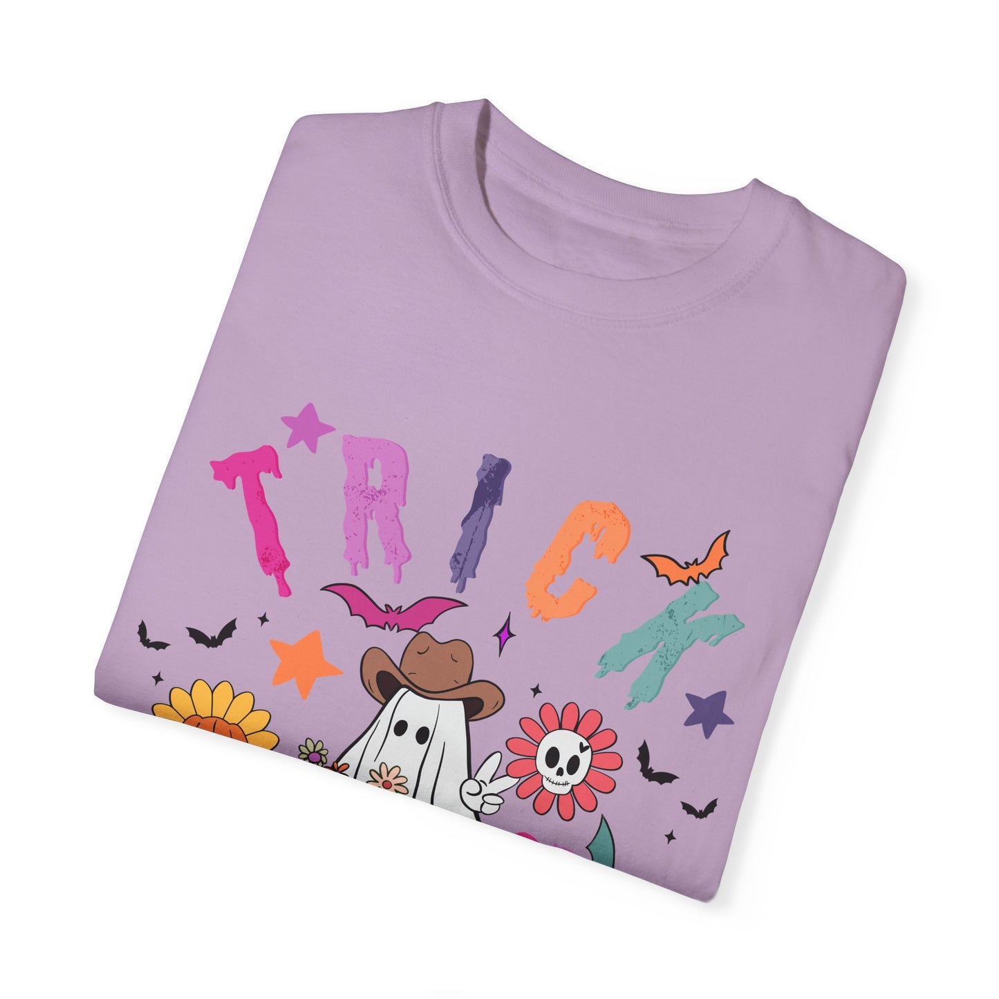 Trick or Treat Cowboy Ghost shirt featuring a playful cowboy ghost design and melty font. Available in unisex sizes S-3XL, this ultra-soft, garment-dyed 100% ring-spun cotton t-shirt is perfect for Halloween celebrations for adults and teens.