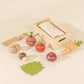 Kids’ wooden veggie playset with a market basket, 7 sliceable veggies & knife for imaginative play.