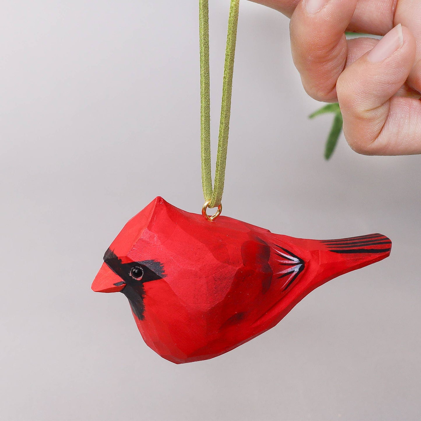 Cardinal bird ornament painted red with custom details