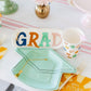 Occasions By Shakira grad napkins, 18-pack, 5” x 5” with gold foil, perfect for grad parties.