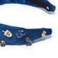 Indigo velvet kids' headband with 14k gold-plated dreidel charms and crystals, supporting Israel.